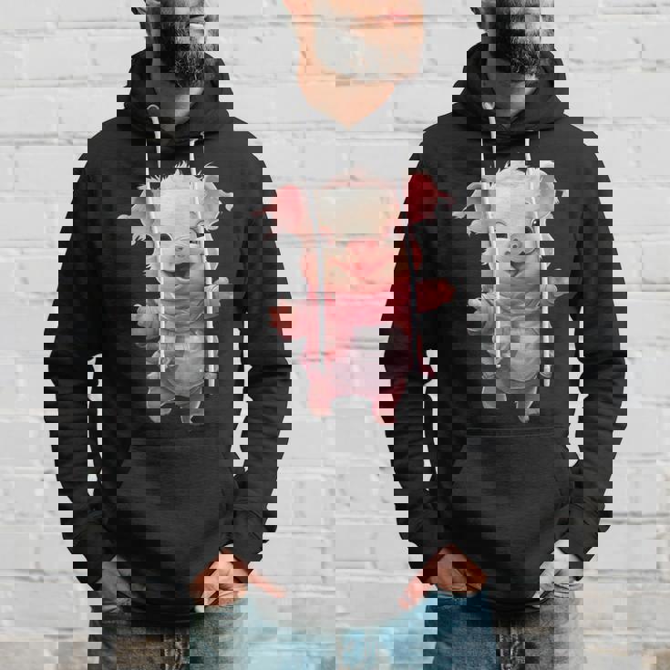 帽子とスカーフを着た豚のクリスマスプレゼント パーカー 彼への贈り物