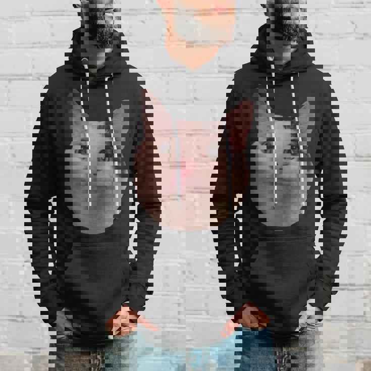 微笑む猫のミームベルーガ パーカー 彼への贈り物