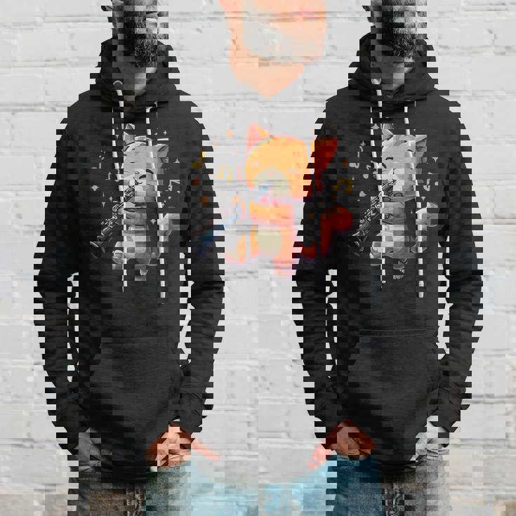 猫好きのためのかわいい猫のデザイン 猫がクラリネットを弾く パーカー 彼への贈り物