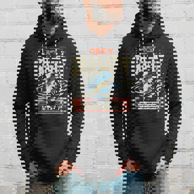 重力に従いなさい、それが法です Obey Gravity It's The Law パーカー 彼への贈り物