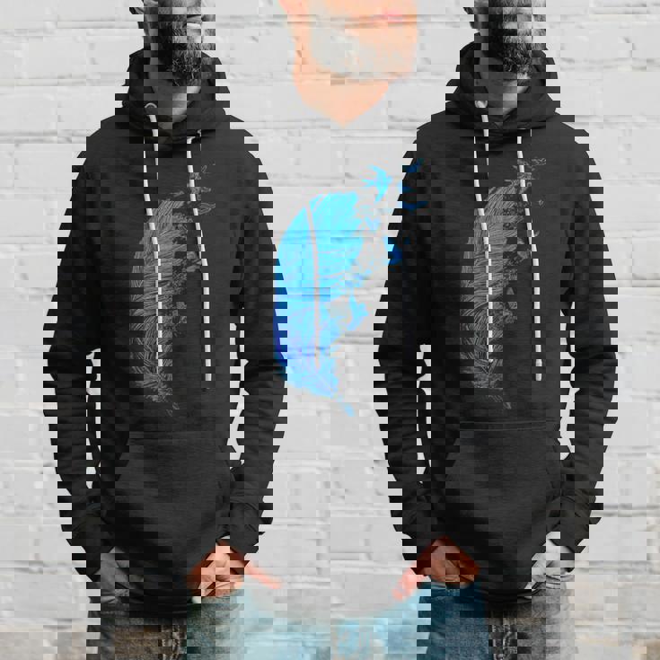 青い羽と鳥が飛んでいる青い羽 キュートでスタイリッシュ パーカー 彼への贈り物