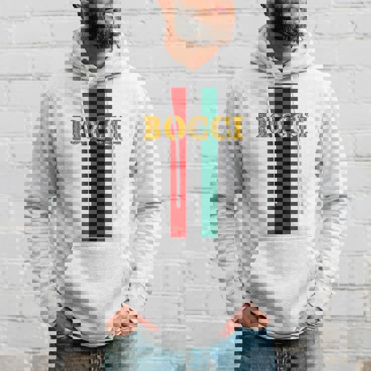 Bocci ぼっち《フェイクゴールド ロゴ》緑 赤 ライン【変なデザイン屋さん】陰キャ オタク ブランド パロディ 面白 長袖tシャツ パーカー 彼への贈り物