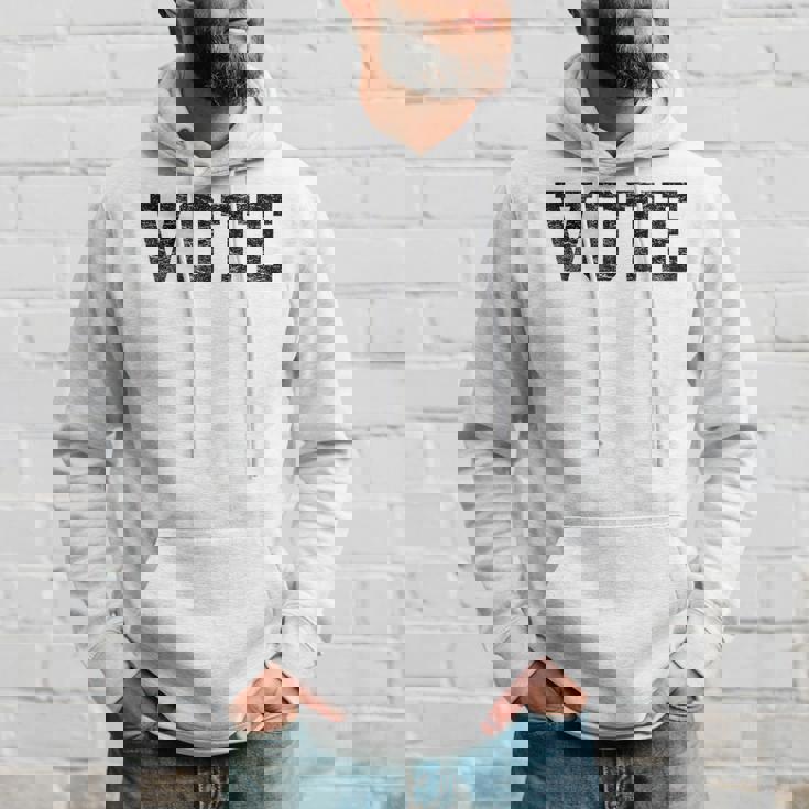 Vote レディース メンズ アンティーク調テキスト 2024 選挙 パーカー 彼への贈り物