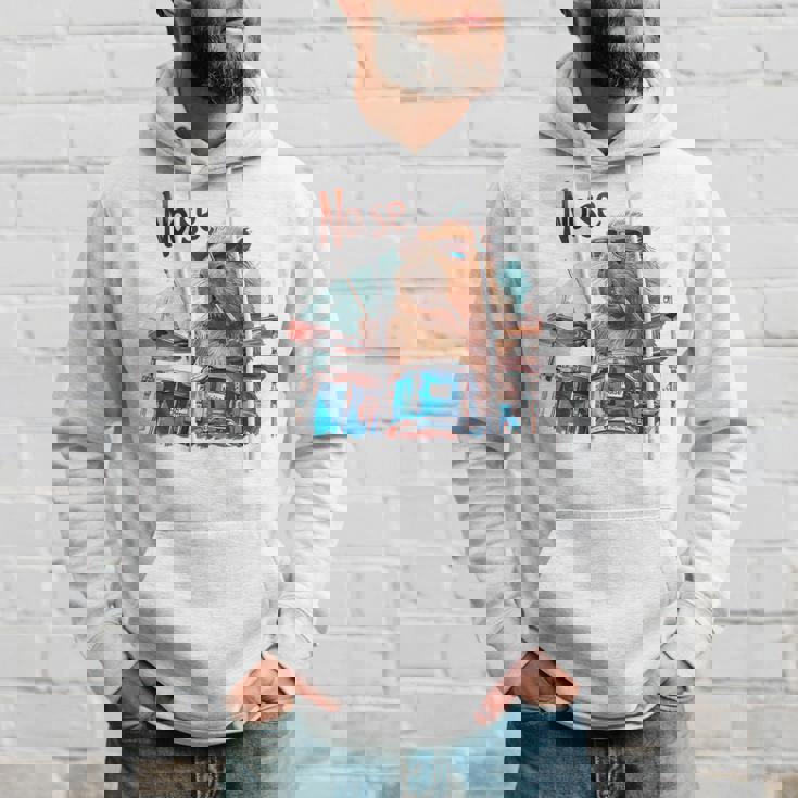 おかしなカピバラがドラムを奏でる パーカー 彼への贈り物