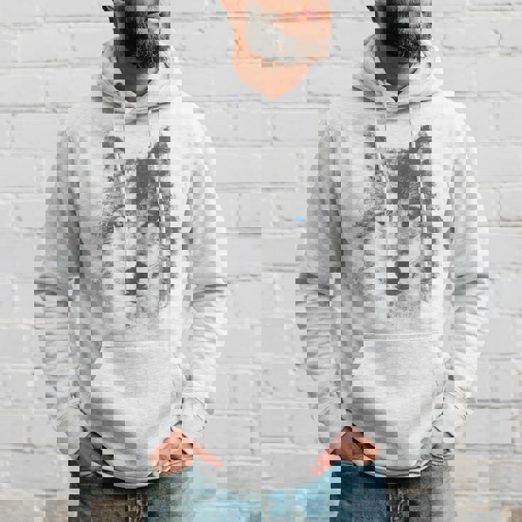 オオカミの顔 青い目 美的スマッジアートスタイル 野生動物 パーカー 彼への贈り物