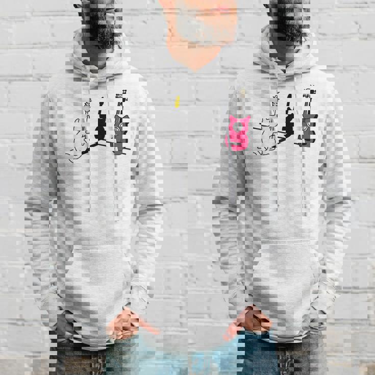 ギターの影を作る猫デザイン パーカー 彼への贈り物