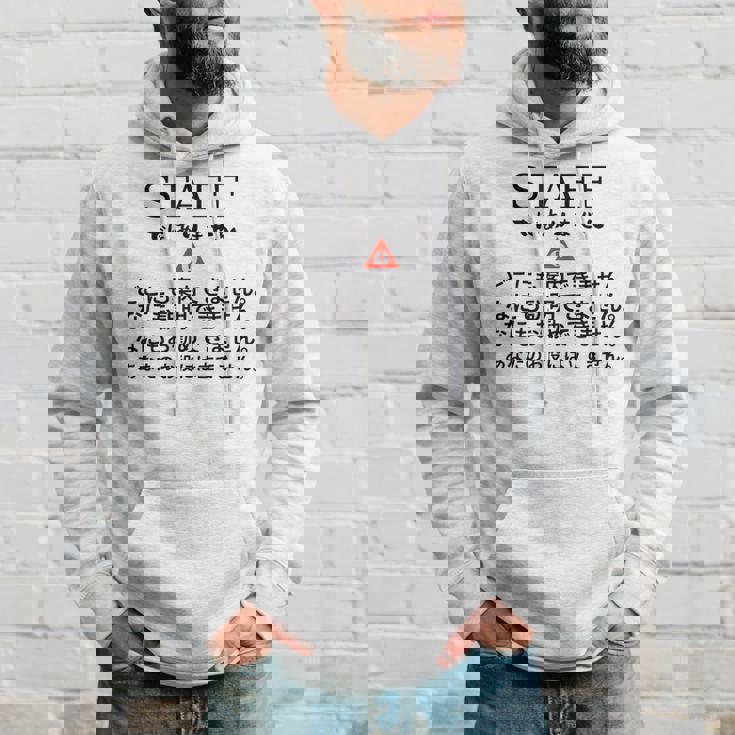 職場で使えるstaffではありませんユーモアグラフィック パーカー 彼への贈り物