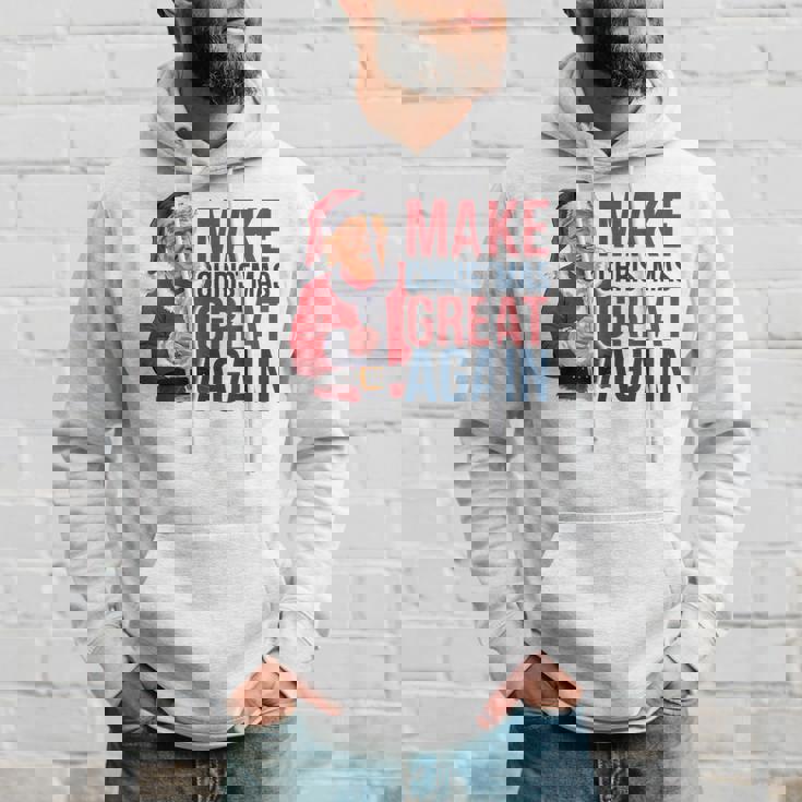 面白いクリスマスグレートアゲイントランプサンタファンusaホリデー 2024 パーカー 彼への贈り物