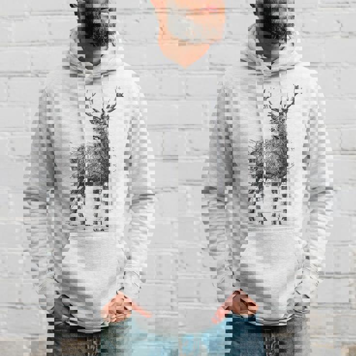 鹿 絵 グラフィック 動物 アート モチーフ 鹿 パーカー 彼への贈り物