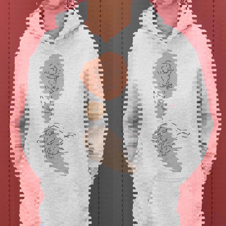 抽象的でミニマリストなラインアート、花柄。 レディースパーカー