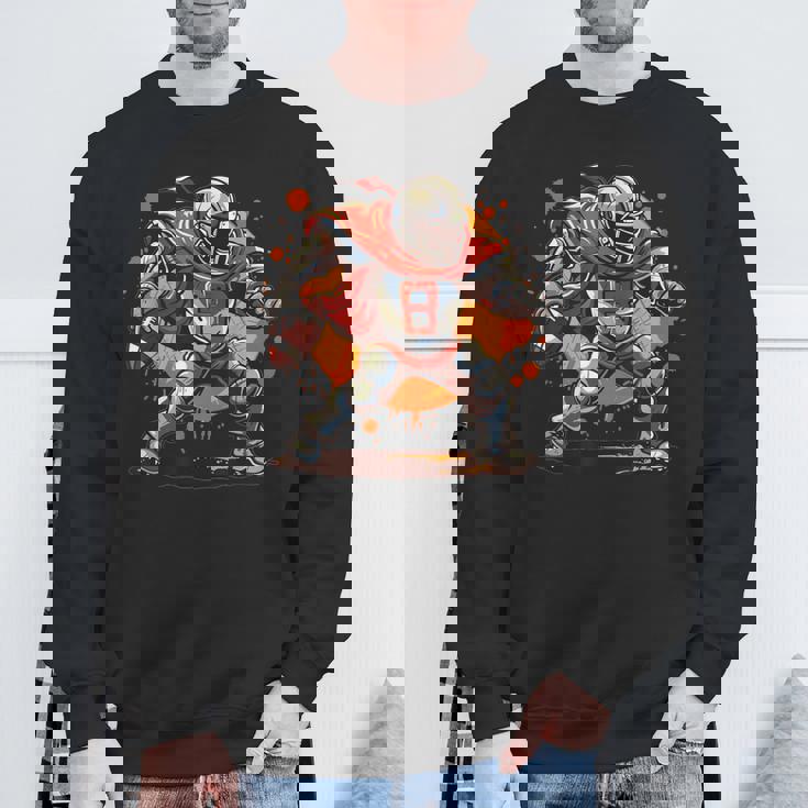 アメリカンフットボールのコスチュームを着たストロングナイト。 スウェットシャツ 高齢者への贈り物