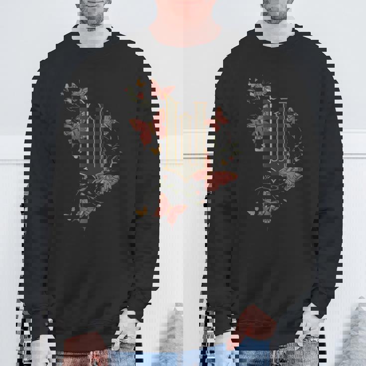 ウィキッドムービーロゴ W バタフライ スウェットシャツ 高齢者への贈り物