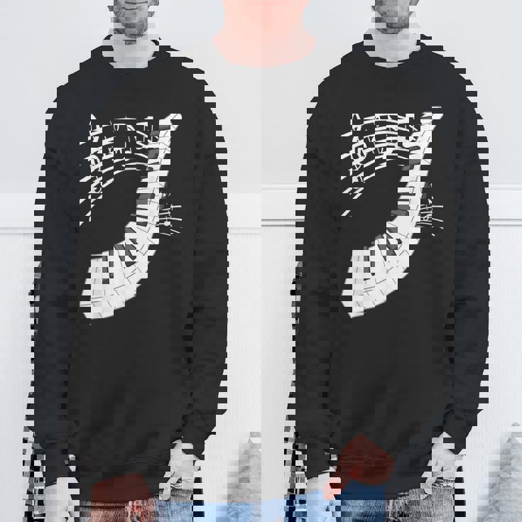 ピアノの鍵盤・音符・楽器ピアノ スウェットシャツ 高齢者への贈り物