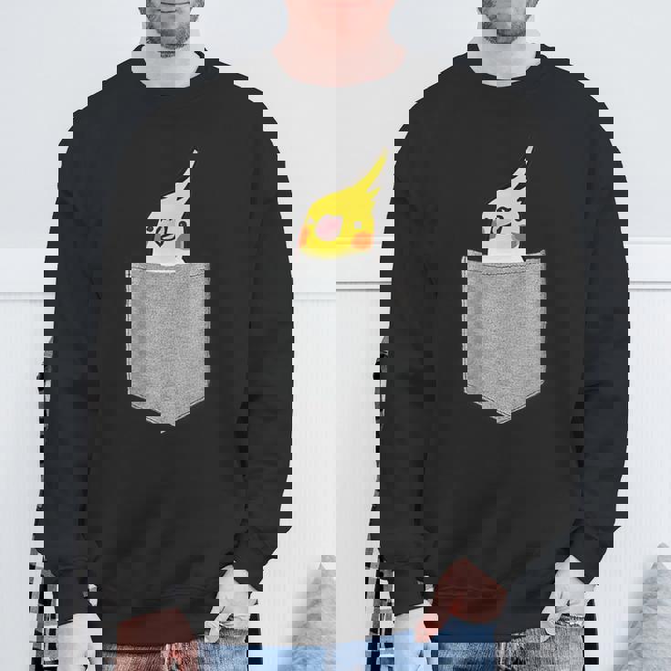 ポケットから覗くオカメインコのデザイン スウェットシャツ 高齢者への贈り物