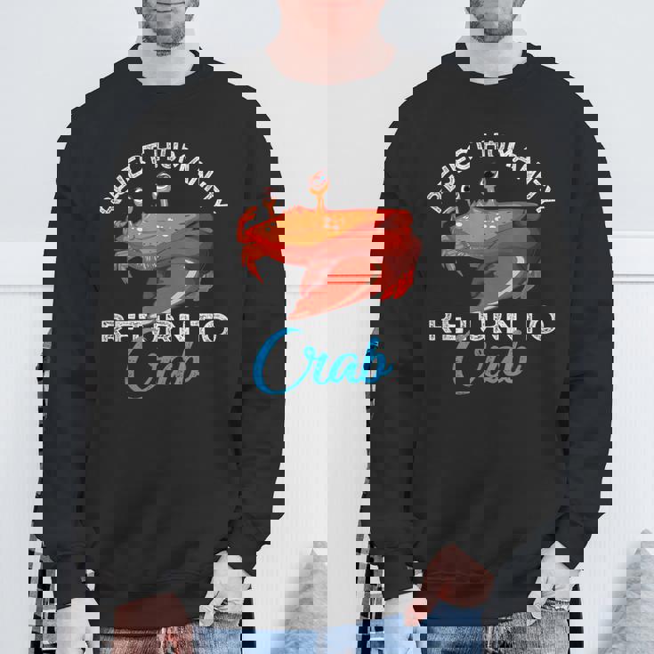 人類を拒絶するカニに戻る進化カニを抱きしめろ スウェットシャツ 高齢者への贈り物