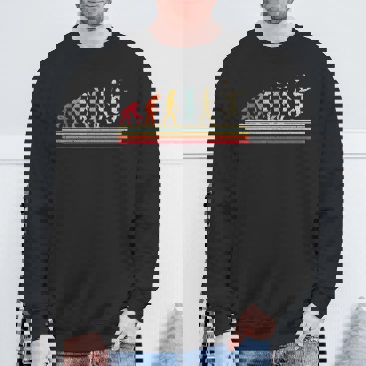 人類進化 バドミントンデザイン スウェットシャツ 高齢者への贈り物