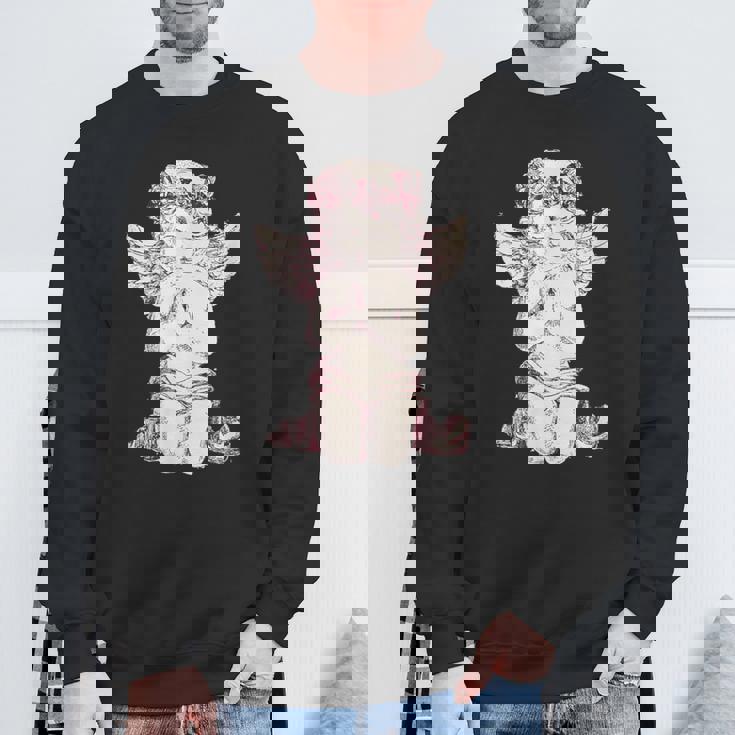 天使の羽を持つ膝の上の美的天使を祈る スウェットシャツ 高齢者への贈り物