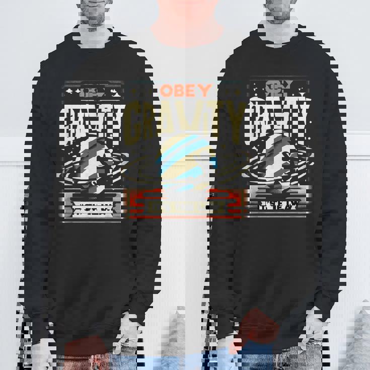 重力に従いなさい、それが法です Obey Gravity It's The Law スウェットシャツ 高齢者への贈り物