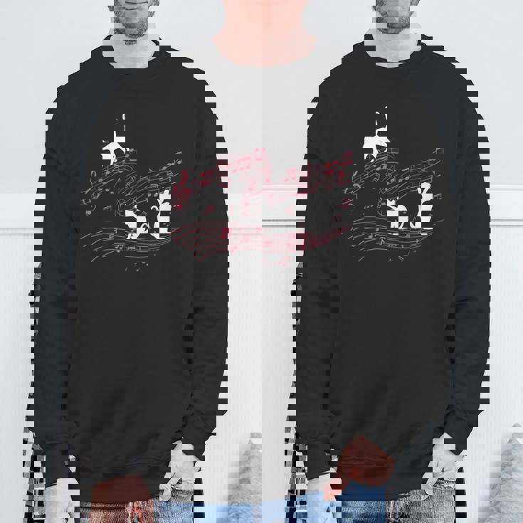 音符で遊ぶ3匹の猫 楽譜 スウェットシャツ 高齢者への贈り物