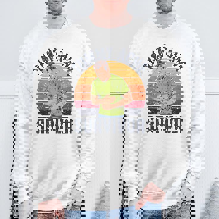 おなかが痛い スウェットシャツ 高齢者への贈り物