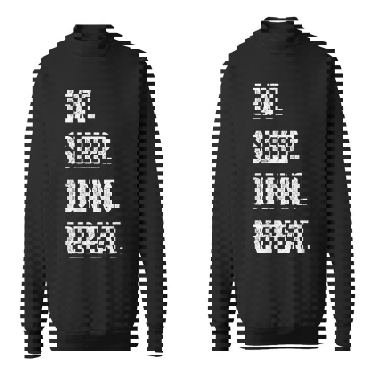 イート・スリープ・ディスクダンノ・リピート スウェットシャツ