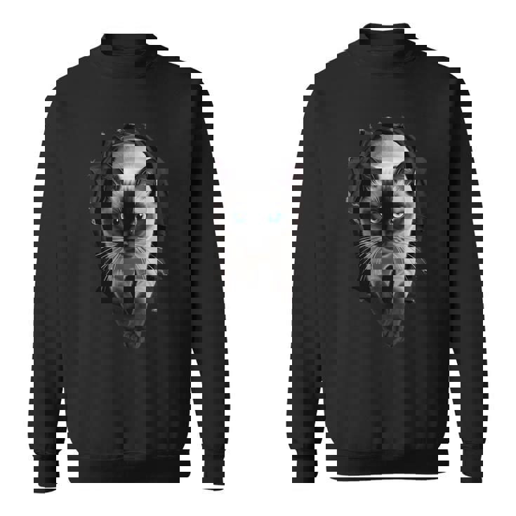 シャム猫が破れた布を突き破り、猫好きに最適です。 スウェットシャツ