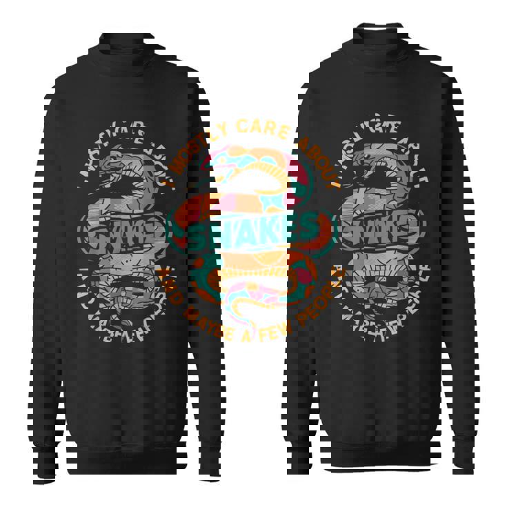 ヘビのお世話 面白い スウェットシャツ