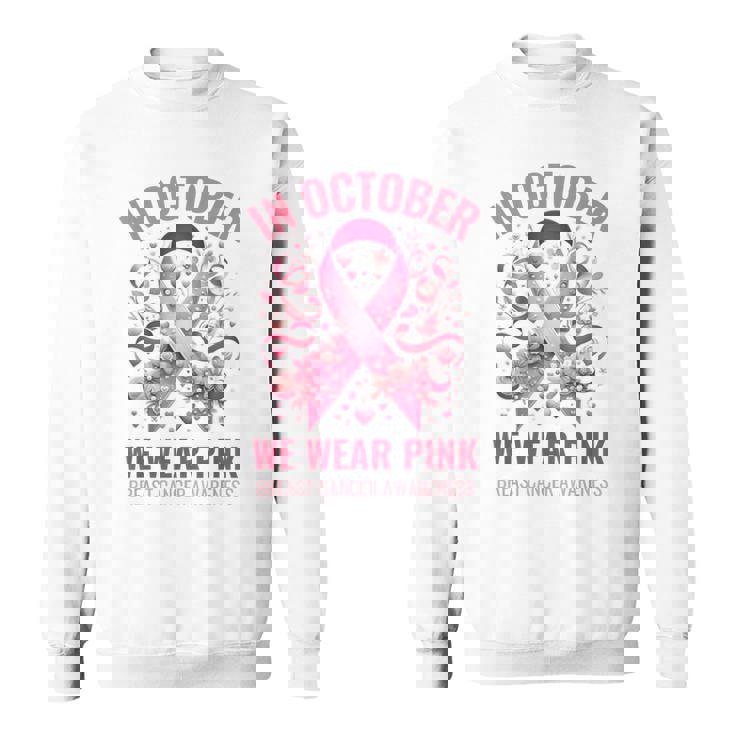 10月にはピンクリボンデザインの乳がんウォークを着用 スウェットシャツ