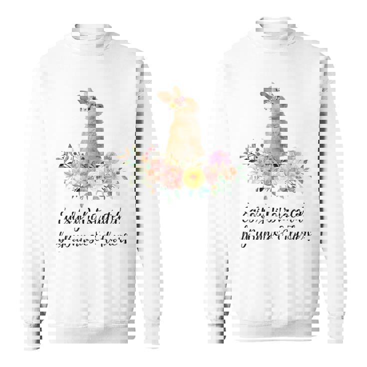 うさぎと花に気が散りやすい ウサギ かわいいウサギ スウェットシャツ