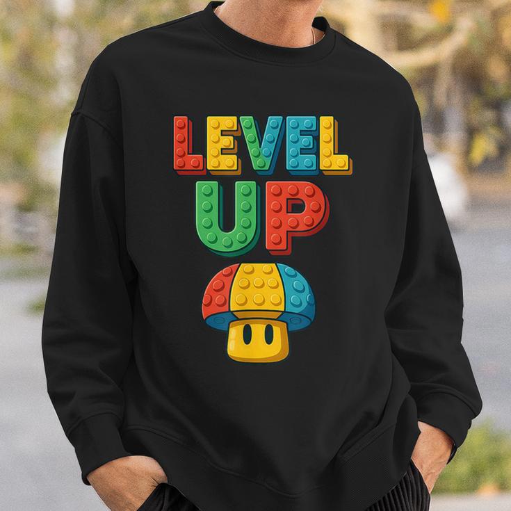 Level Up Block Lettering Powerup Gamer Sweatshirt | Mazezy