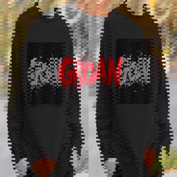 うめき声の衣装で苦労を表現しましょう。 スウェットシャツ 彼への贈り物