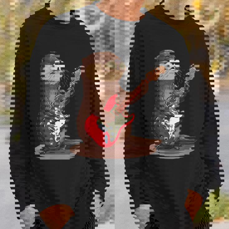 かわいいカワウソがギターを弾くコスチューム。 スウェットシャツ 彼への贈り物