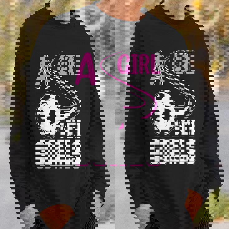 サッカーでゴールを決めた少女 スウェットシャツ 彼への贈り物