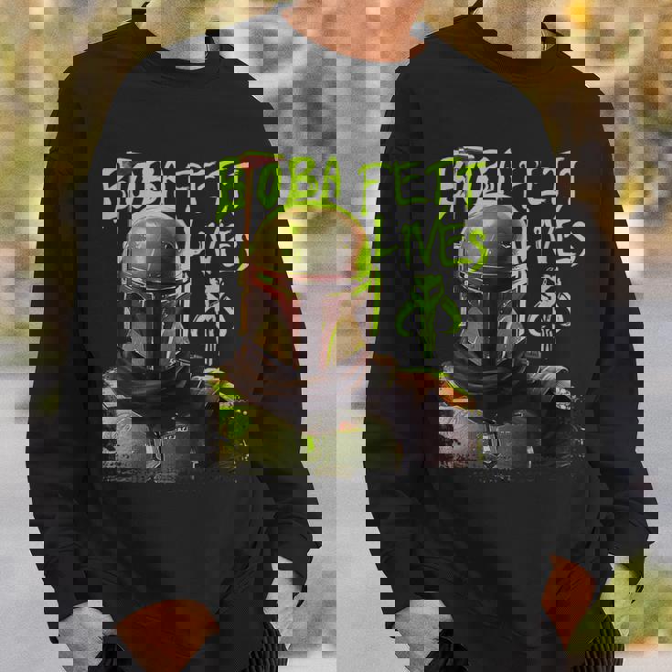 スター・ウォーズ ボバ・フェットの本 ネオン・ボバ・フェット・ライヴズ ポスター スウェットシャツ 彼への贈り物