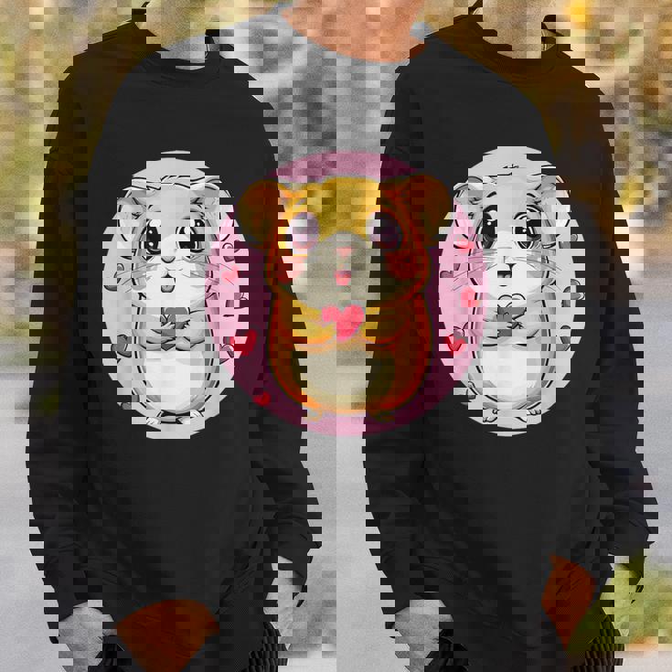 ハートに囲まれたハートを持つかわいいハムスター スウェットシャツ 彼への贈り物