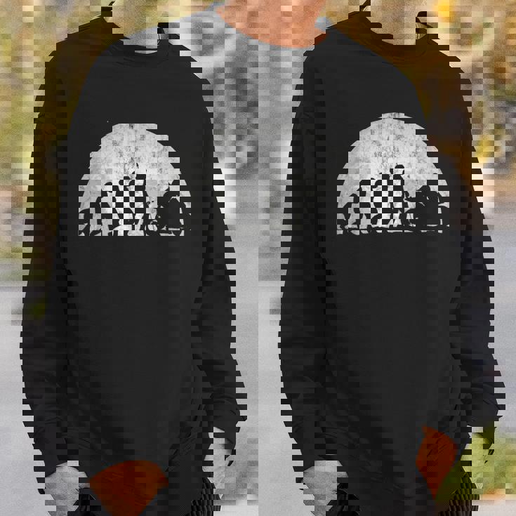 バイカーの進化-人間のモーターサイクルモータースポーツの進化 スウェットシャツ 彼への贈り物