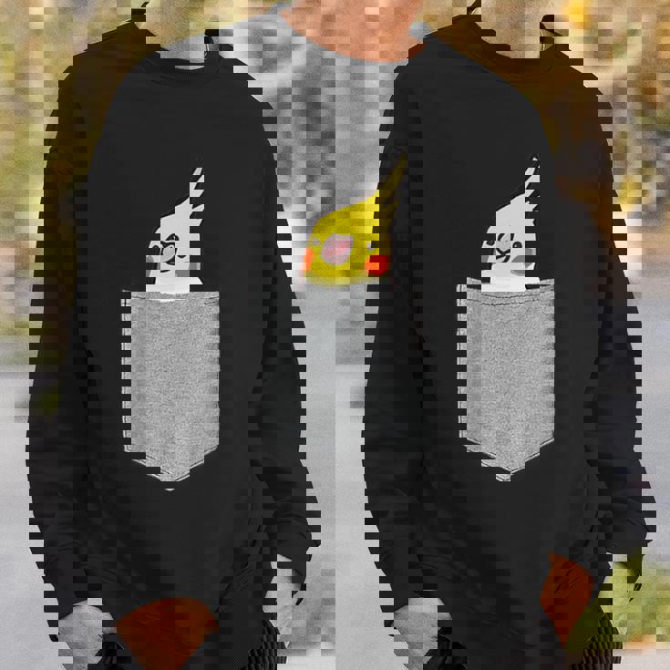 ポケットから覗くオカメインコのデザイン スウェットシャツ 彼への贈り物