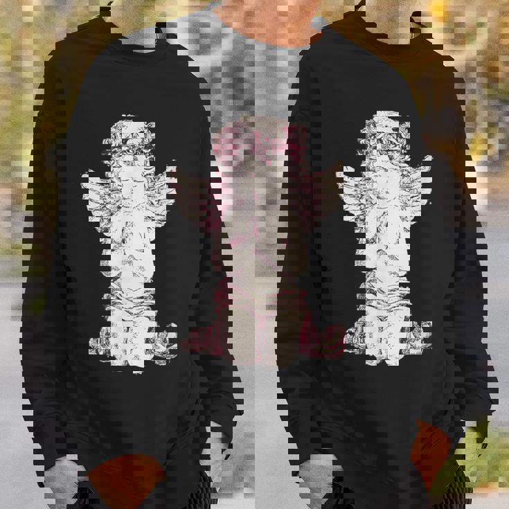 天使の羽を持つ膝の上の美的天使を祈る スウェットシャツ 彼への贈り物