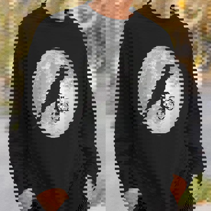 恐竜 ダイナソー 面白いtシャツ ティラノサウルス 月と自転車 サイクリング アート メンズ 子供 おもしろ 服 ネタ スウェットシャツ 彼への贈り物