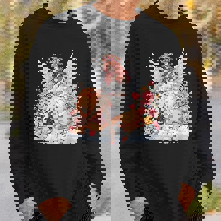 花に囲まれたライオンの天使 美しい天使 スウェットシャツ 彼への贈り物