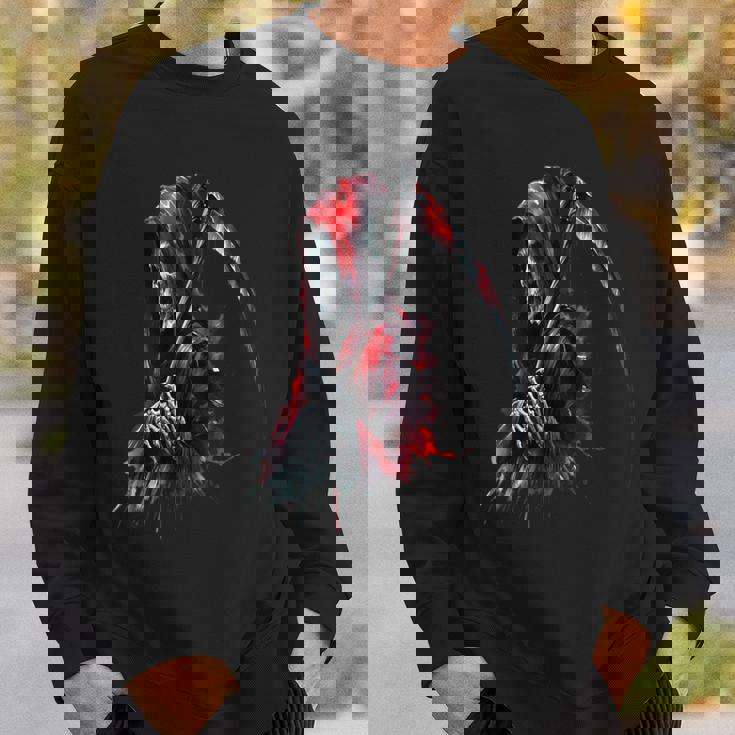 黒と赤のデザインの死神。 スウェットシャツ 彼への贈り物