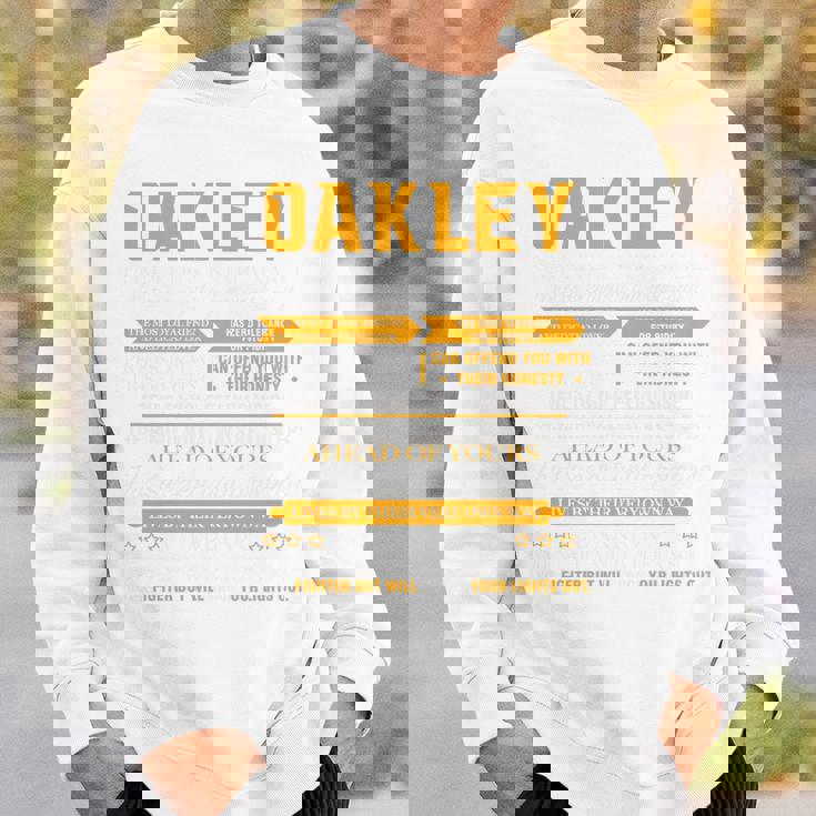 Oakleyオークリー 完全訳不明なネームシャツ フロントプリント 1Kana 長袖tシャツ スウェットシャツ 彼への贈り物