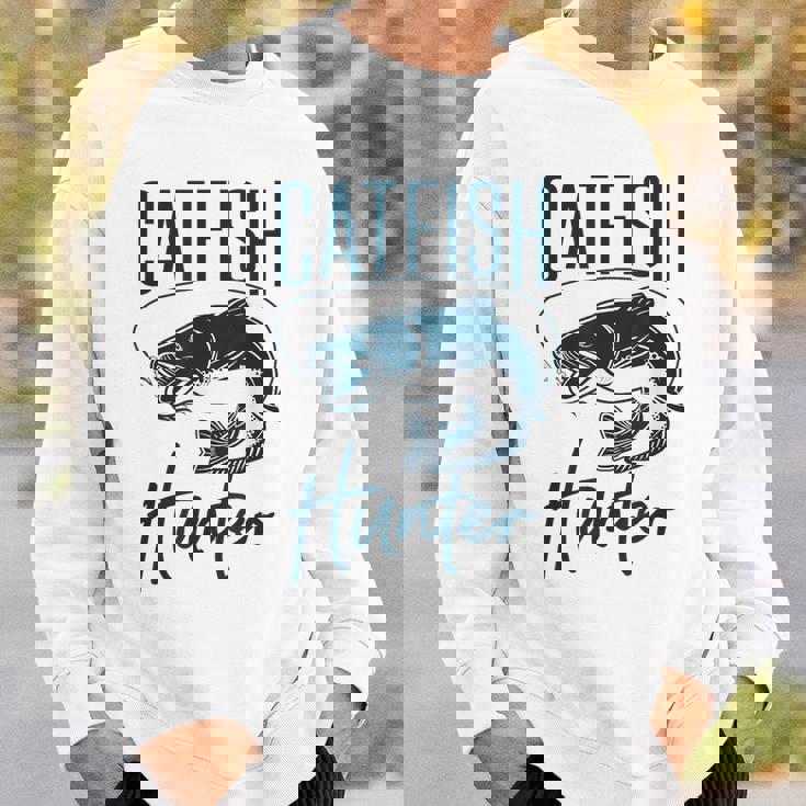 かわいいナマズハンターデザイン ナマズ農家へのギフトアイデア スウェットシャツ 彼への贈り物