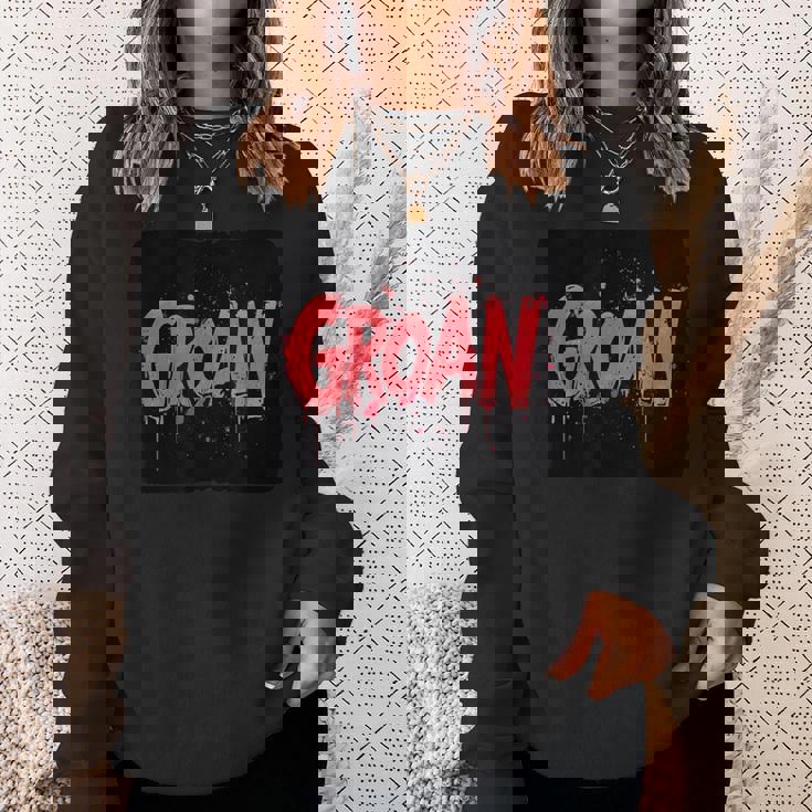 うめき声の衣装で苦労を表現しましょう。 スウェットシャツ 彼女への贈り物