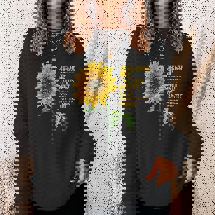 ひまわりガール タトゥー かわいい目 太腿 スウェットシャツ 彼女への贈り物