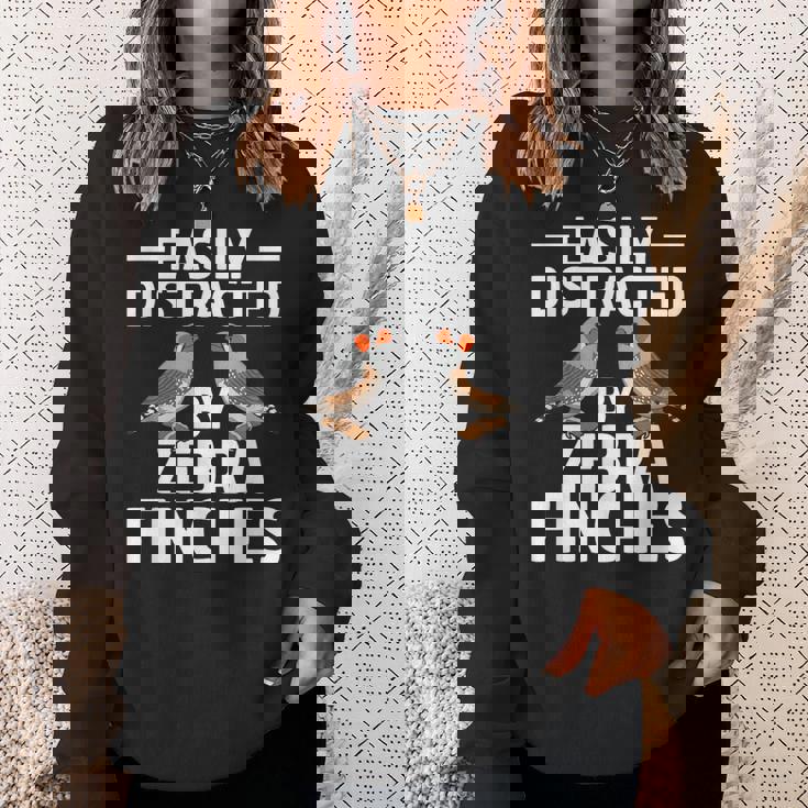 キンカチョウの飼育員はキンカチョウに気をそらされやすい スウェットシャツ 彼女への贈り物