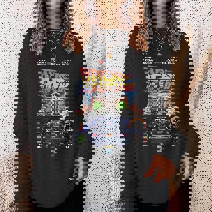 バック・トゥ・ザ・フューチャー 40周年記念ビデオゲームスタイル スウェットシャツ 彼女への贈り物