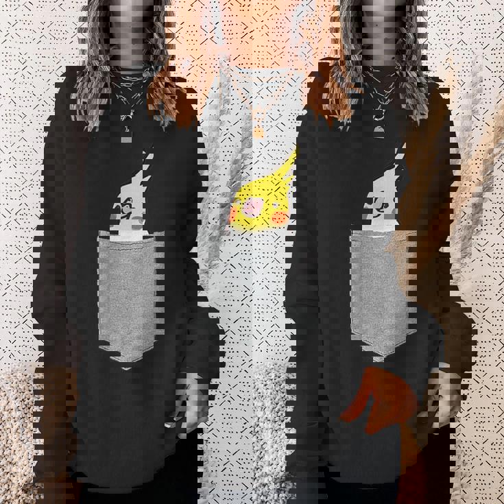 ポケットから覗くオカメインコのデザイン スウェットシャツ 彼女への贈り物