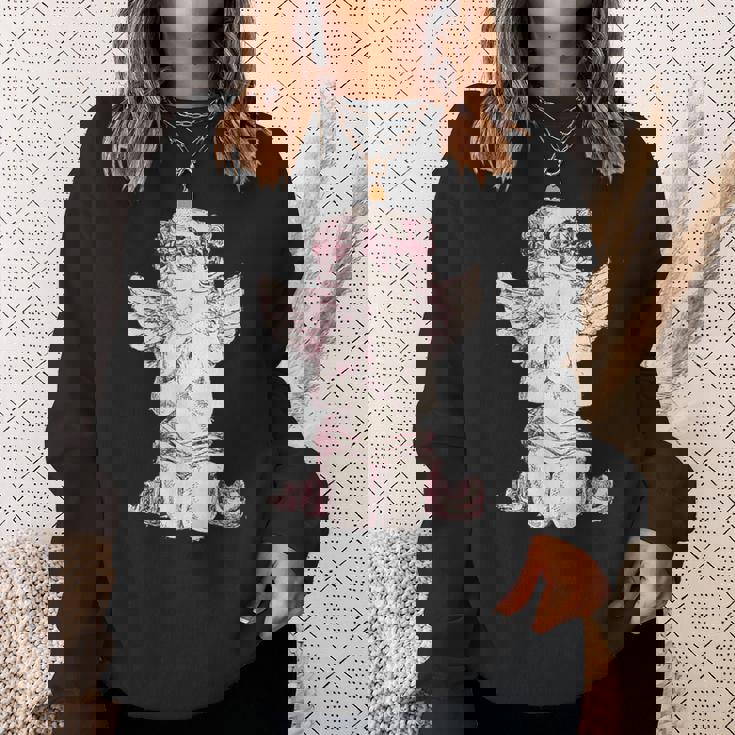 天使の羽を持つ膝の上の美的天使を祈る スウェットシャツ 彼女への贈り物