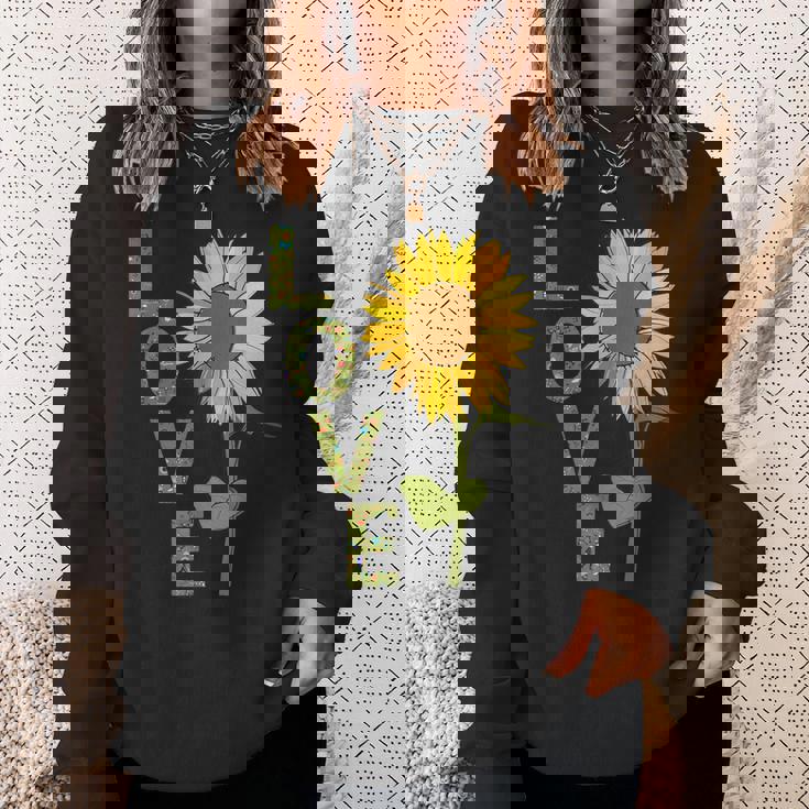 愛の大きなひまわりを作る庭師 スウェットシャツ 彼女への贈り物